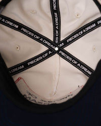 Two-Tone Patchwork Hat - branded interior taping